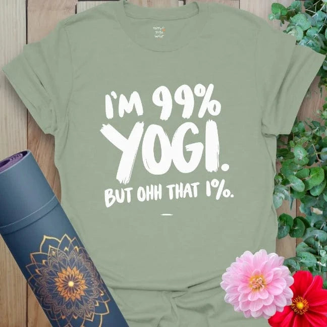 Sage green yoga tee with humorous “99 Percent Yogi” phrase in bold typography for mindful yet bold everyday wear.