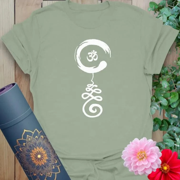 Sage green yoga t-shirt featuring subtle spiritual symbol inspired by Om and energetic grounding, ideal for meditative movement.