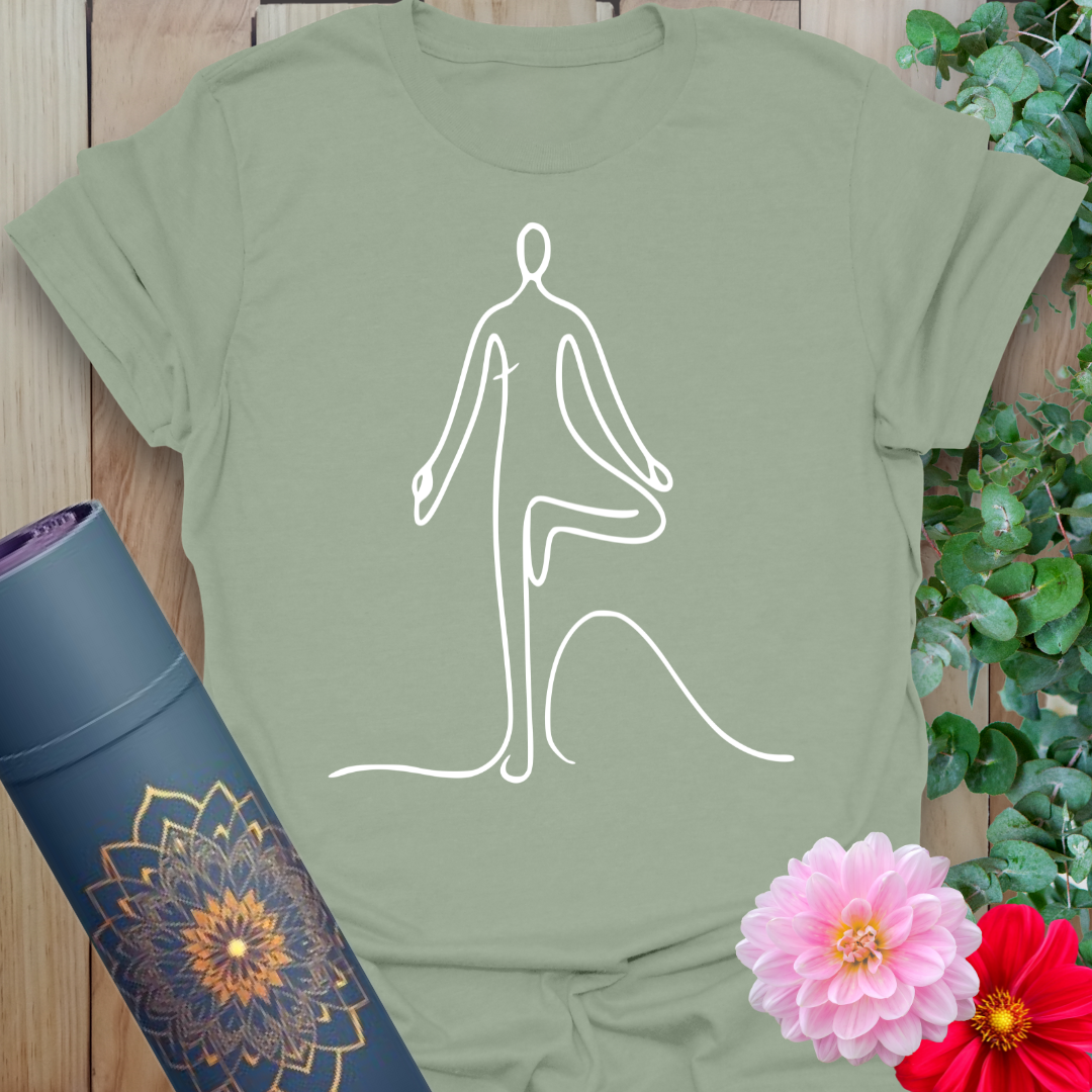 Sage green yoga t-shirt with elegant Vrksasana silhouette in line drawing style for grounding and presence.