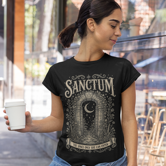 Woman wearing Sanctum black meditation shirt on a city street — Dark Sacred Stillness collection by Ramro Yoga Wear