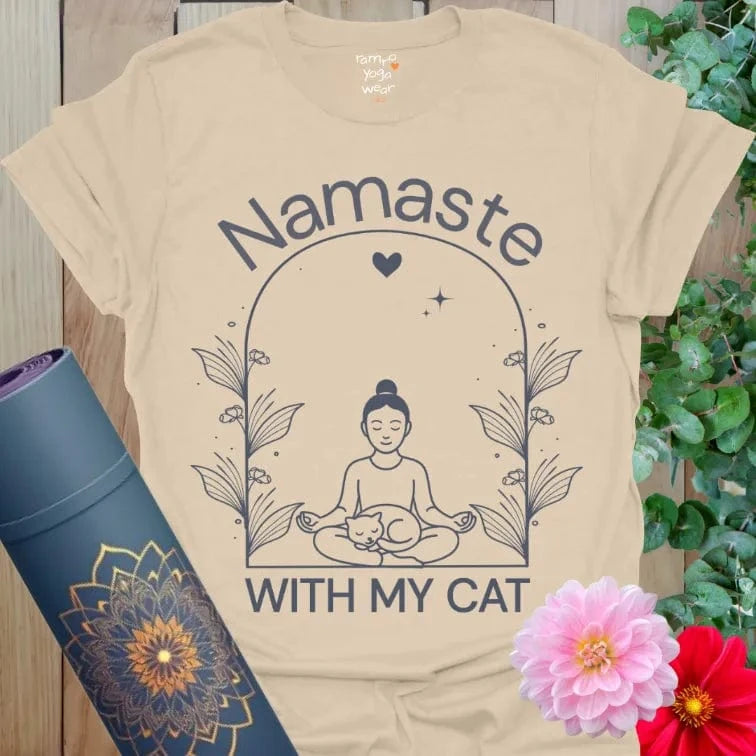Sand Cat Nap T-Shirt featuring yoga-inspired Namaste design with cat cuddled in lap.