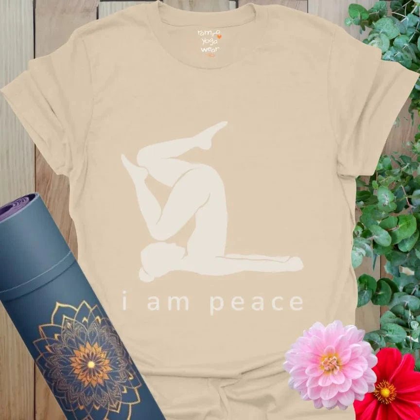 Sand beige tee with a relaxed yoga design and words "i am peace."