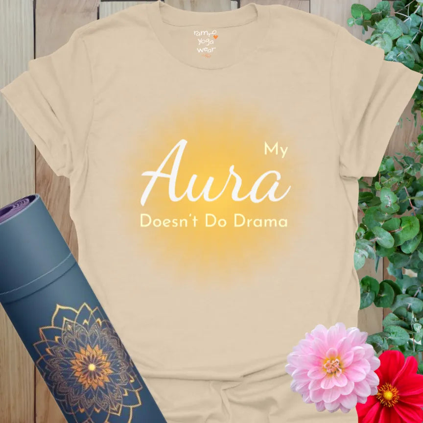 Neutral beige tee with soft golden aura and gentle typography. Grounded and drama-free yoga lifestyle shirt.