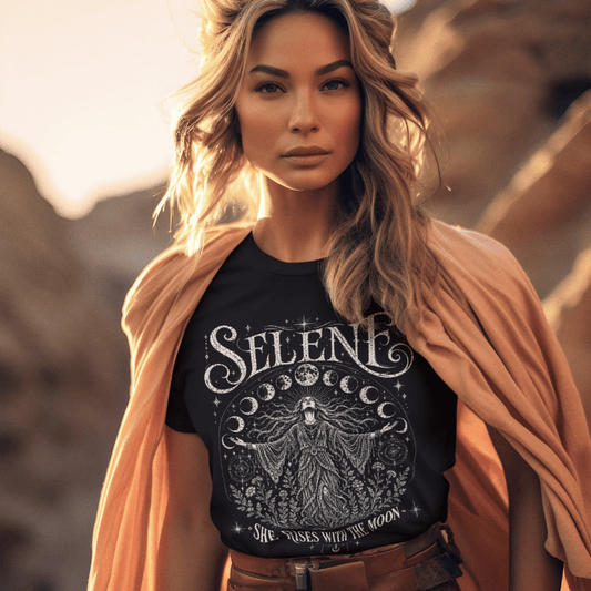 Ramro Yoga Wear Selene tee in Black — vintage celestial Selene design, desert golden hour lifestyle shot