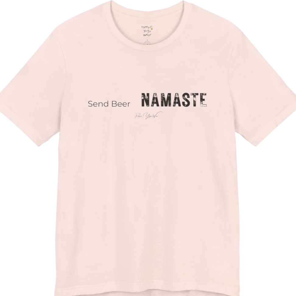 "Send Beer" in small script, followed by a bold "NAMASTE" lettering. Send Beer T-Shirt flat lay is a Bella+Canvas 3001 and the color is Soft Pink.