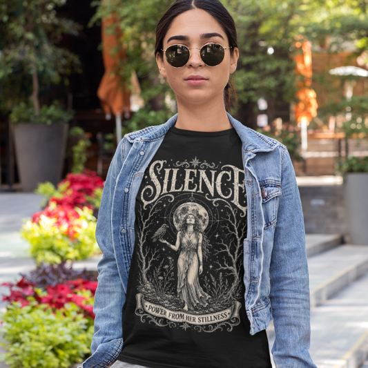 Woman wearing Silence black sacred meditation shirt in the city — Dark Sacred Stillness collection by Ramro Yoga Wear