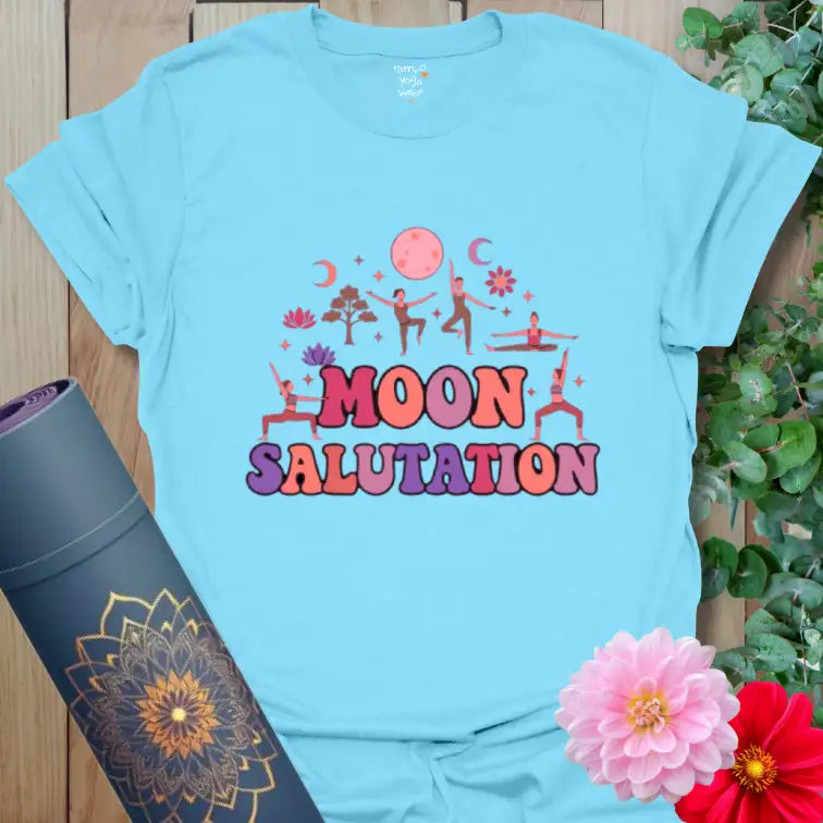 Sky Moon Salutation T-Shirt with celestial yoga illustration in soothing lavender and coral. Perfect for moonlight practice.