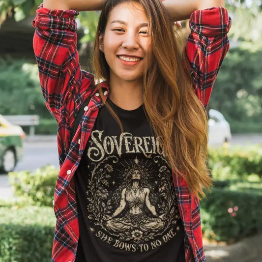 Ramro Yoga Wear Sovereign tee in Black — crowned goddess meditation botanical vintage design, outdoor park lifestyle shot