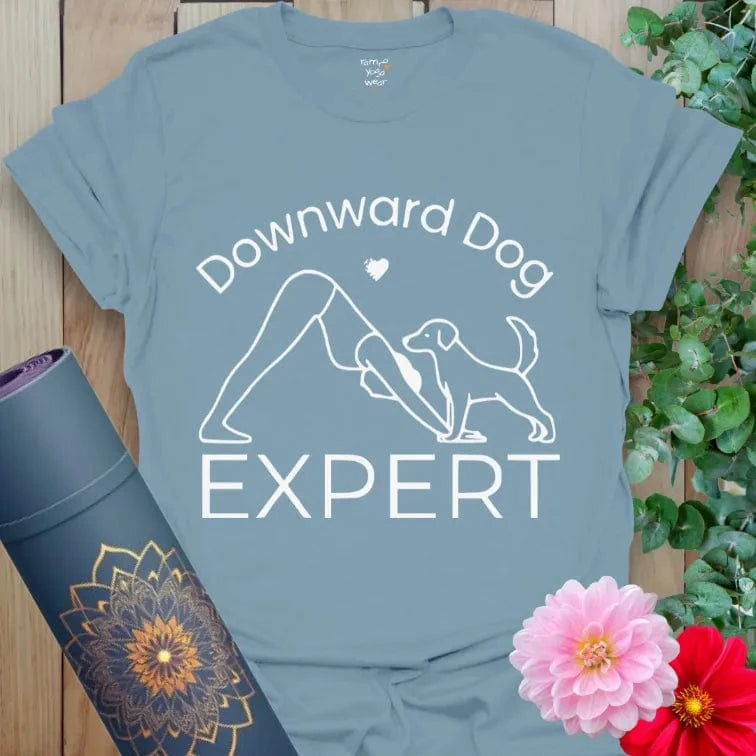 Stone Blue Dog Expert T-Shirt featuring yoga and pup illustration. A must-have for yoga and dog enthusiasts.