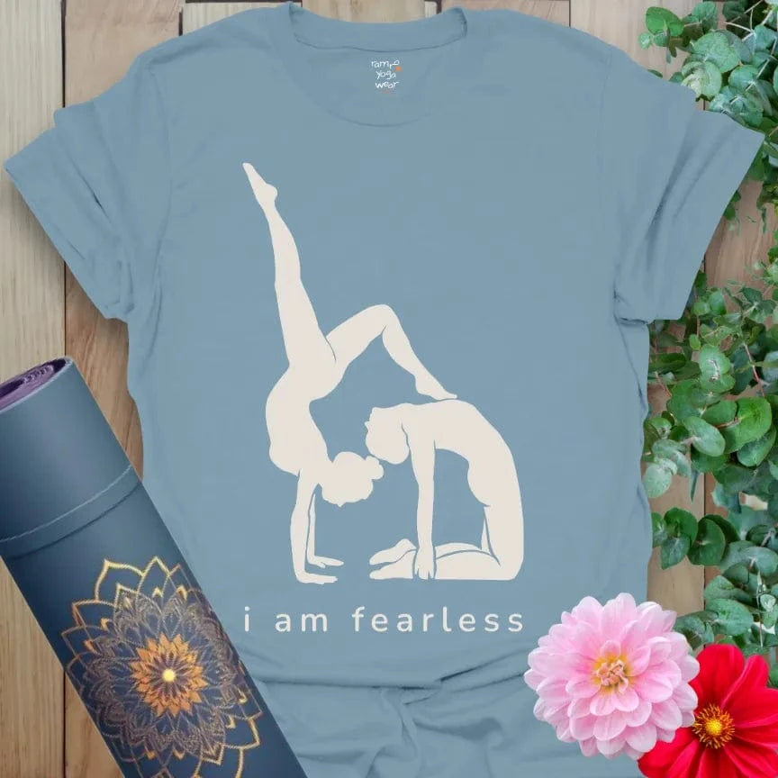 Stone Blue Fearless T-Shirt with empowering text “I Am Fearless” and yoga pose design. Everyday yoga wear for strength and flow.