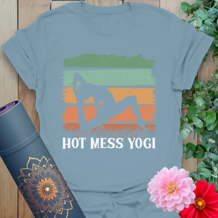 Muted stone blue yoga t-shirt featuring playful backbend yogi and retro design celebrating messy, beautiful yoga journeys.