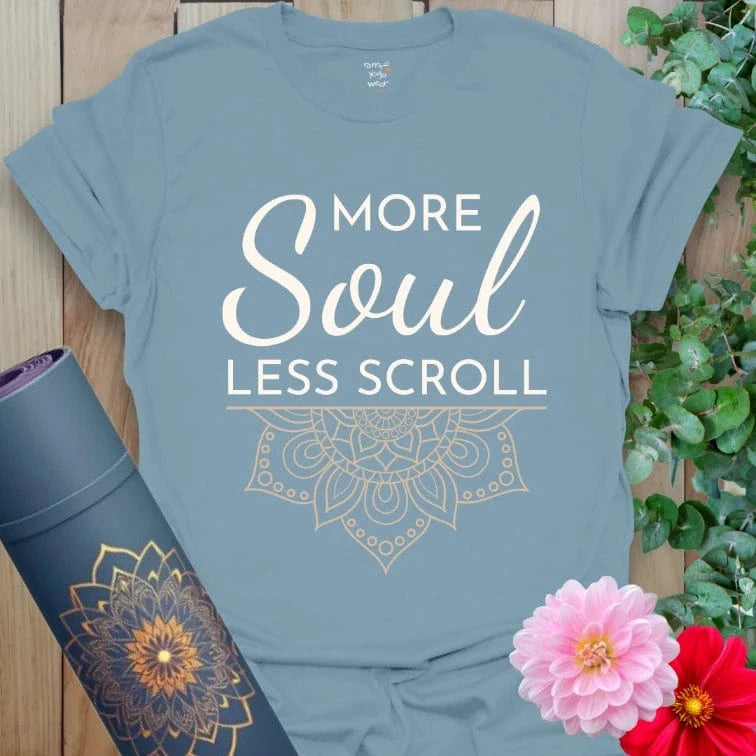 Stone Blue Less Scroll T-Shirt with soft white print and intricate mandala design. Casual wear with soulful message.