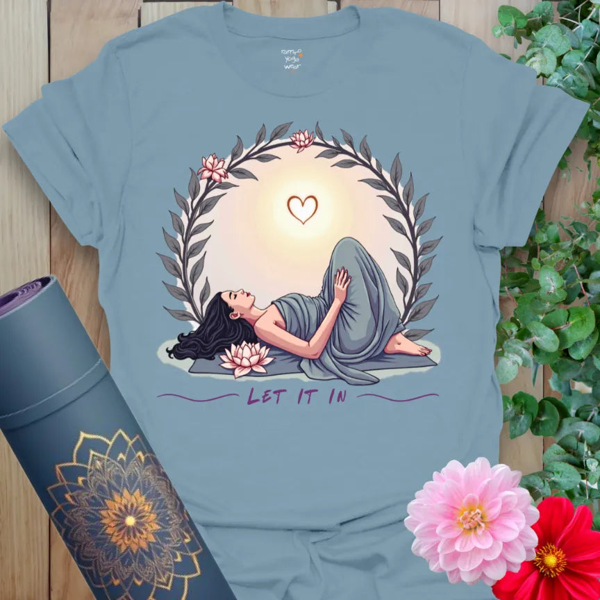 Muted stone blue yoga t-shirt with soulful yogi pose and heart-opening sunrise design for grounded, mindful living.