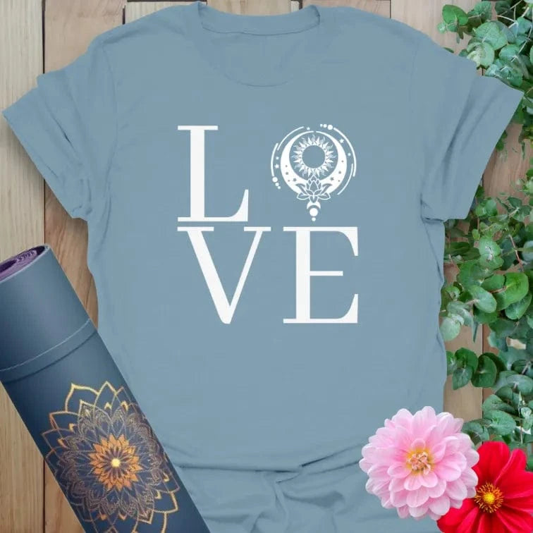 Muted stone blue yoga t-shirt featuring bold "LOVE" message with sacred symbol for peaceful, soulful expression.