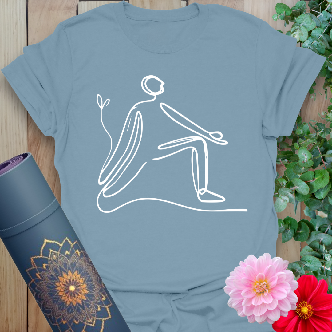 Muted stone blue yoga t-shirt showcasing minimalist lunge pose artwork inspiring grounded strength and conscious flow.