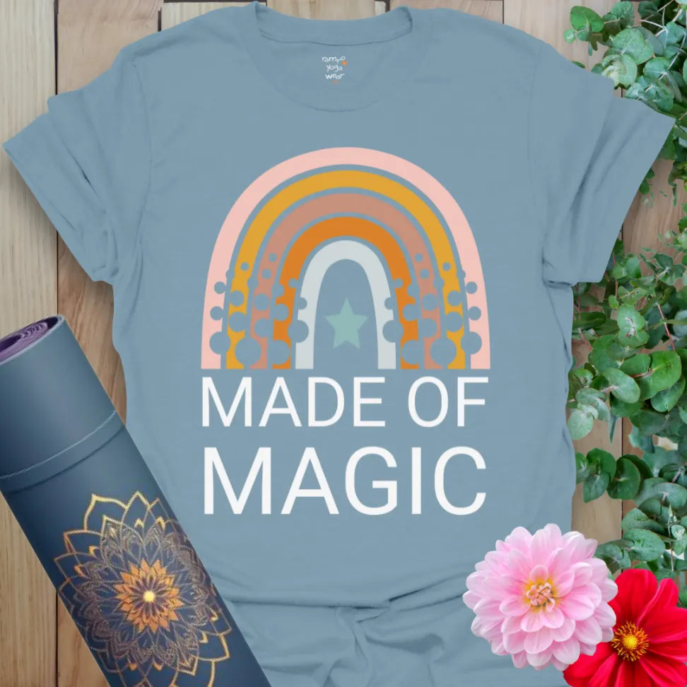 Muted stone blue yoga t-shirt with colorful rainbow and star design celebrating the magic within and conscious soulful living.