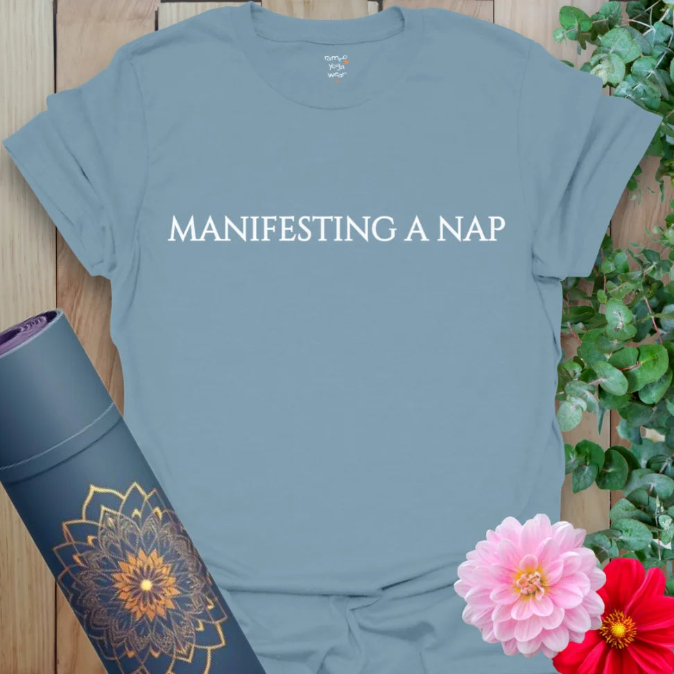 Muted stone blue tee with playful “Manifesting A Nap” text, perfect for yogis, meditators, and nap enthusiasts.