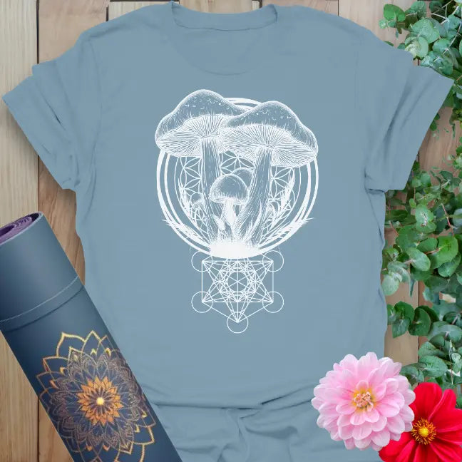 Muted stone blue yoga t-shirt with sacred mushrooms and geometric grounding design inspiring soulful, natural connection.