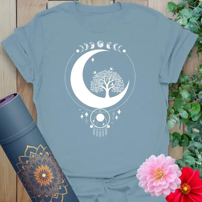 Muted stone blue yoga t-shirt with mystical moon and tree of life design inspiring spiritual connection, growth, and soulful expansion.