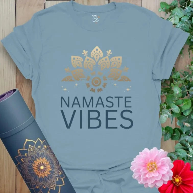 Stone Blue Namaste Vibes T-Shirt with mandala design in gold and Namaste Vibes affirmation. Yoga-inspired mindful fashion.