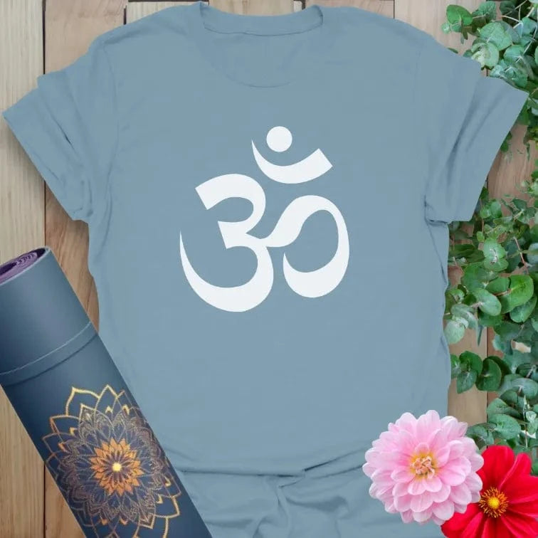 Muted stone blue yoga t-shirt with bold sacred Om design inspiring spiritual growth, mindful practice, and conscious harmony.