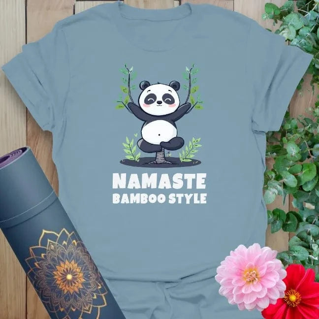 Muted stone blue yoga t-shirt with charming panda and bamboo artwork symbolizing playful mindfulness and everyday joy.