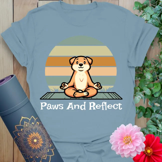 Muted stone blue yoga t-shirt featuring adorable meditating pup design for joyful, soulful, heart-centered living.