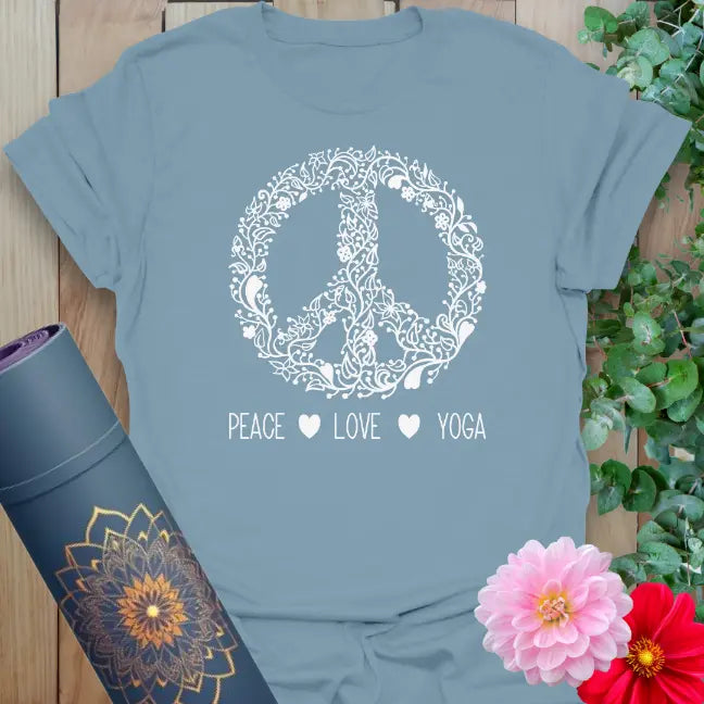 Muted stone blue yoga t-shirt with intricate peace symbol artwork and mindful living message for conscious, soulful journeys.