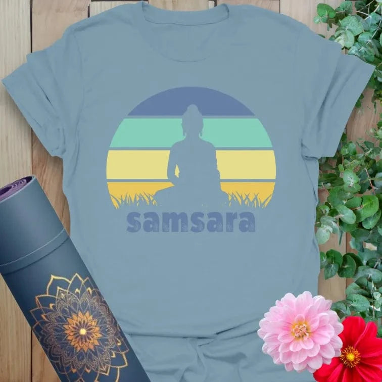 Muted stone blue yoga t-shirt with soulful meditation sunset scene and "samsara" design promoting conscious, soulful living.