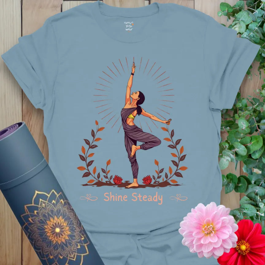 Muted stone blue yoga t-shirt with yoga strength design and steady shine message for soulful movement and intentional living.