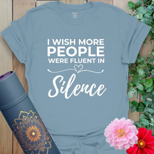 Muted stone blue yoga t-shirt with playful and wise silence quote encouraging conscious connection and heart-centered mindfulness.