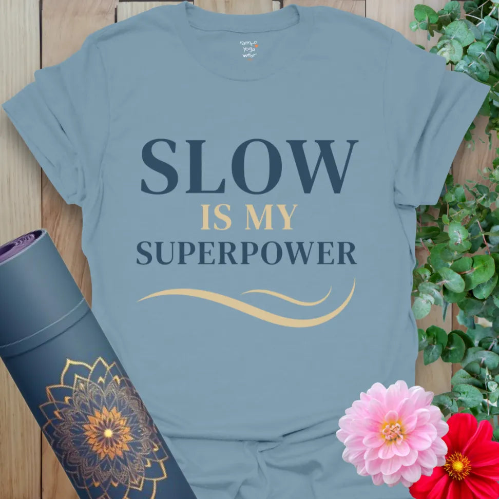 Stone Blue Slow T-Shirt featuring empowering mantra and soft movement-inspired graphic. Perfect for slow flow and daily calm.