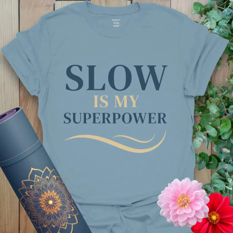 Stone Blue Slow T-Shirt featuring empowering mantra and soft movement-inspired graphic. Perfect for slow flow and daily calm.