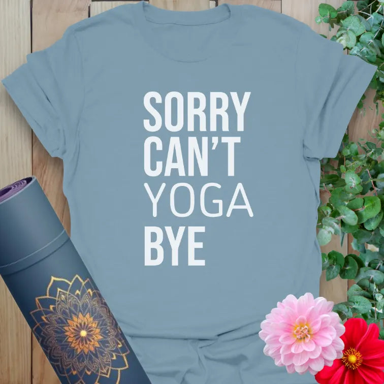 Muted stone blue yoga t-shirt featuring minimalist yoga-themed quote design for mindful, cheeky everyday wear.