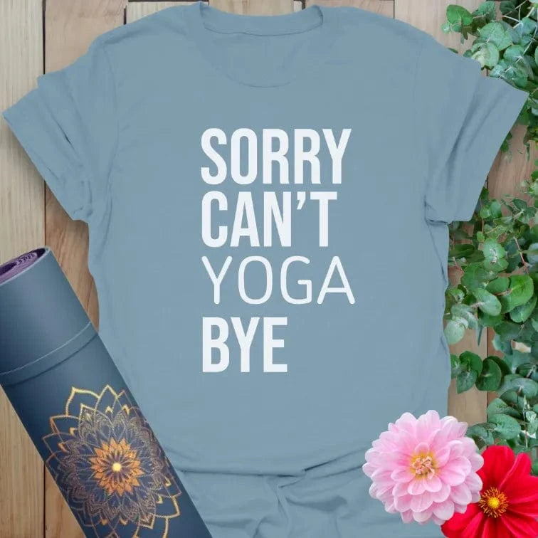 Muted stone blue yoga t-shirt featuring minimalist yoga-themed quote design for mindful, cheeky everyday wear.