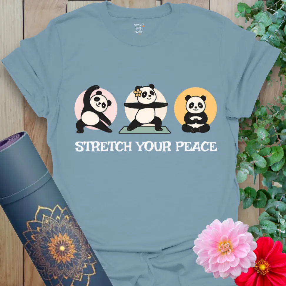 Muted stone blue yoga t-shirt with three panda characters and “Stretch Your Peace” script for soulful, fun movement.