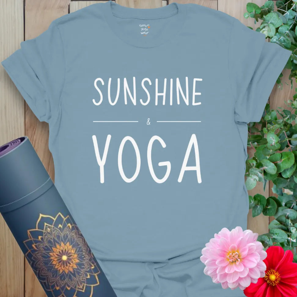 Muted stone blue yoga t-shirt featuring minimalist “Sunshine & Yoga” text for joyful, conscious wear.
