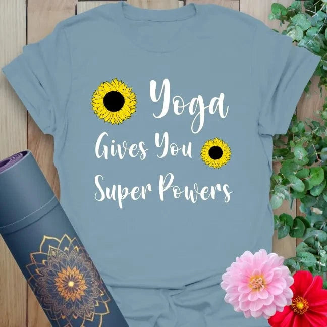 Muted stone blue t-shirt with sunflowers and “Yoga Gives You Super Powers” script for joyful, strength-filled yoga wear.