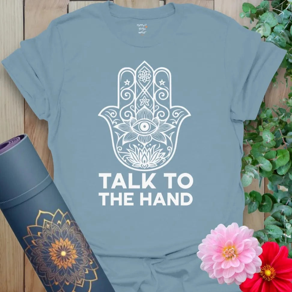 Muted stone blue yoga t-shirt featuring mystical Hamsa hand and humorous message, perfect for high-vibe boundary setting.