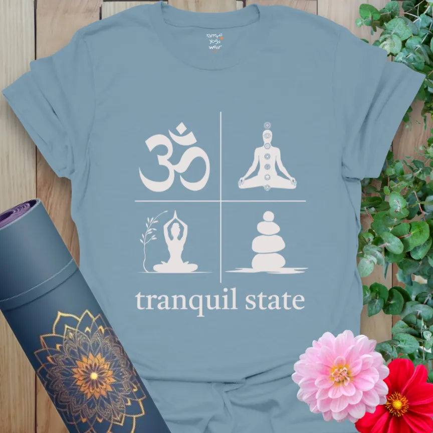 Cool Stone Blue tee showing off icons of mindfulness — perfect for grounding breath and flow practice.