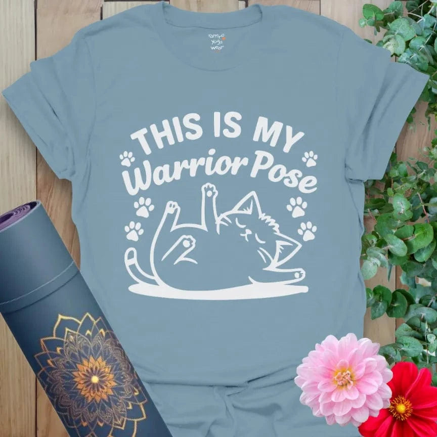 Stone Blue Warrior Cat T-Shirt featuring a cat in a playful pose. Ideal for yoga practice or gifting.