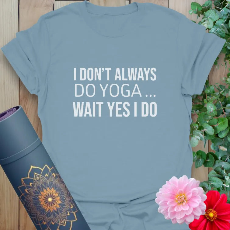 Muted stone blue yoga t-shirt with humorous flow quote for modern, mindful practice wear.