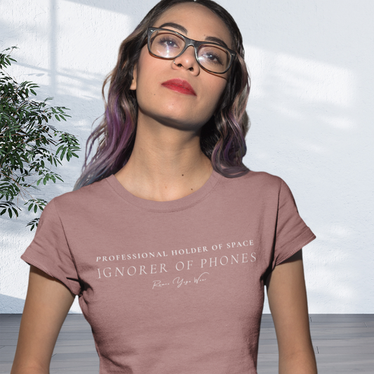 Woman wearing Sub Heather Mauve yoga teacher gift tee against a plain backdrop with a plant — Yoga Teacher Gifts collection by Ramro Yoga Wear