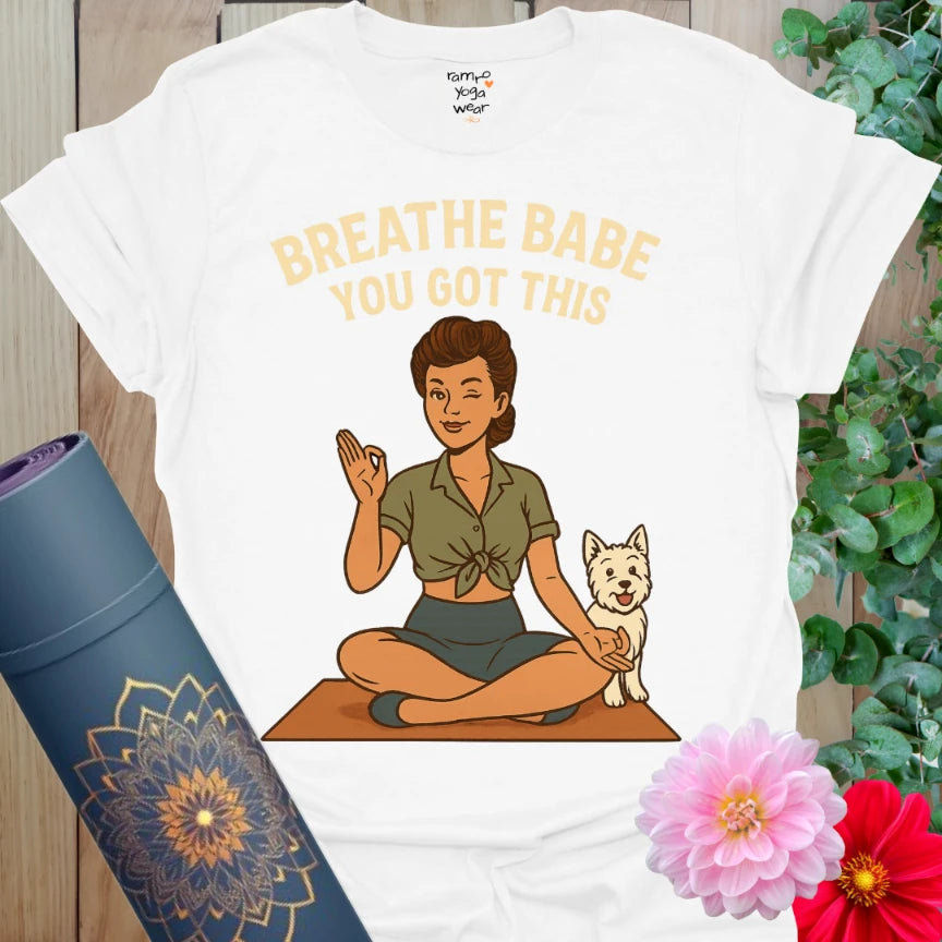 White cotton yoga tee with vintage-style yogi and dog illustration plus bold affirmation: “Breathe Babe You Got This.”