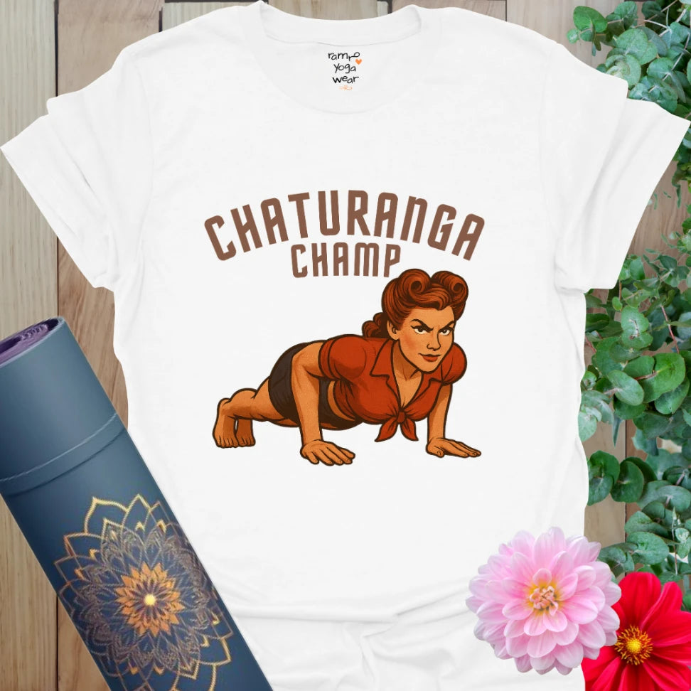 White cotton yoga tee with vintage-style yogi in chaturanga pose and bold “Chaturanga Champ” text.