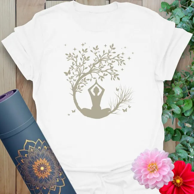 Clean white unisex yoga t-shirt featuring peaceful meditation scene with tree of life and moon for soulful living.