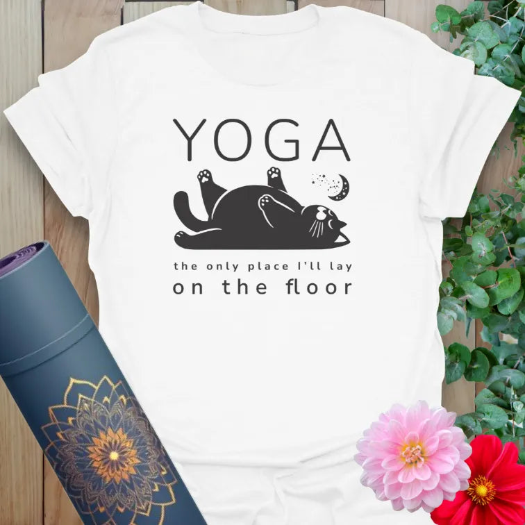 Clean white unisex yoga t-shirt showcasing humorous cat and yoga floor quote perfect for mindful, playful yogis.