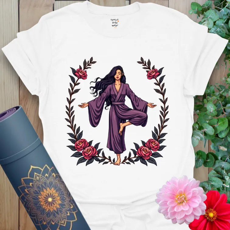 Clean white unisex yoga t-shirt showcasing flowing yogi figure surrounded by blooming roses for soulful, free-spirited living.