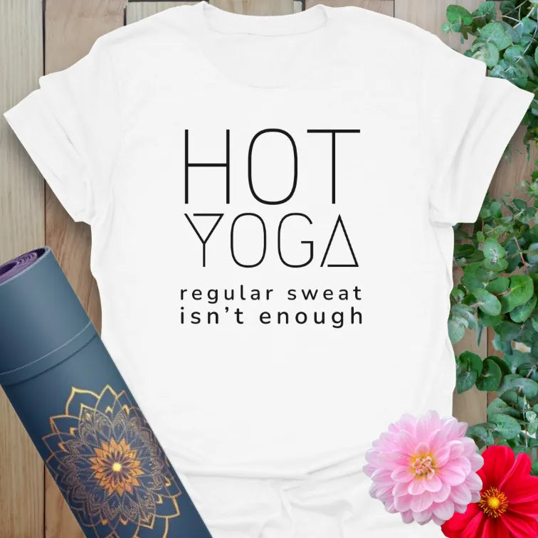 Clean white unisex yoga t-shirt featuring bold hot yoga mantra inspiring mindful sweat and soulful practice.