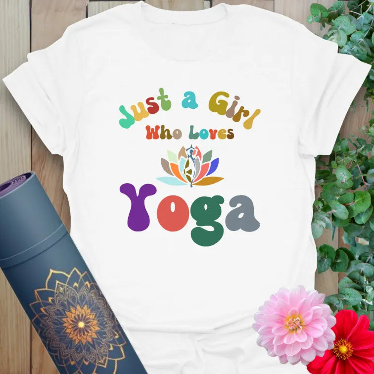 Clean white unisex yoga t-shirt featuring colorful "Just a Girl Who Loves Yoga" text and lotus pose figure for playful, mindful living.